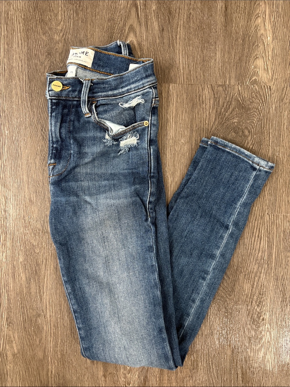 Frame Denim High-Rise Skinny Jeans in Faded Blue